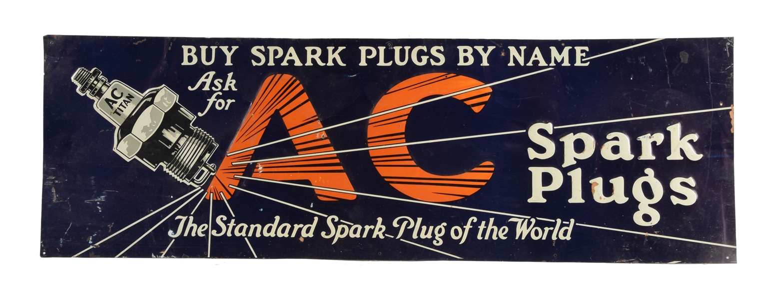 AC SPARK PLUGS EMBOSSED TIN SIGN WITH SPARK PLUG GRAPHIC.
