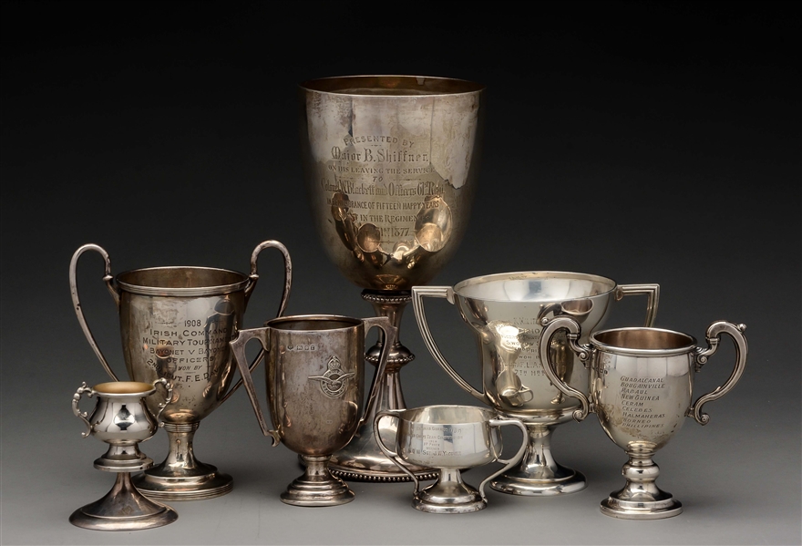 SEVEN SILVER TROPHY CUPS