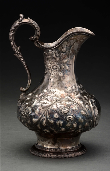 AN AMERICAN COIN SILVER WATER PITCHER. 