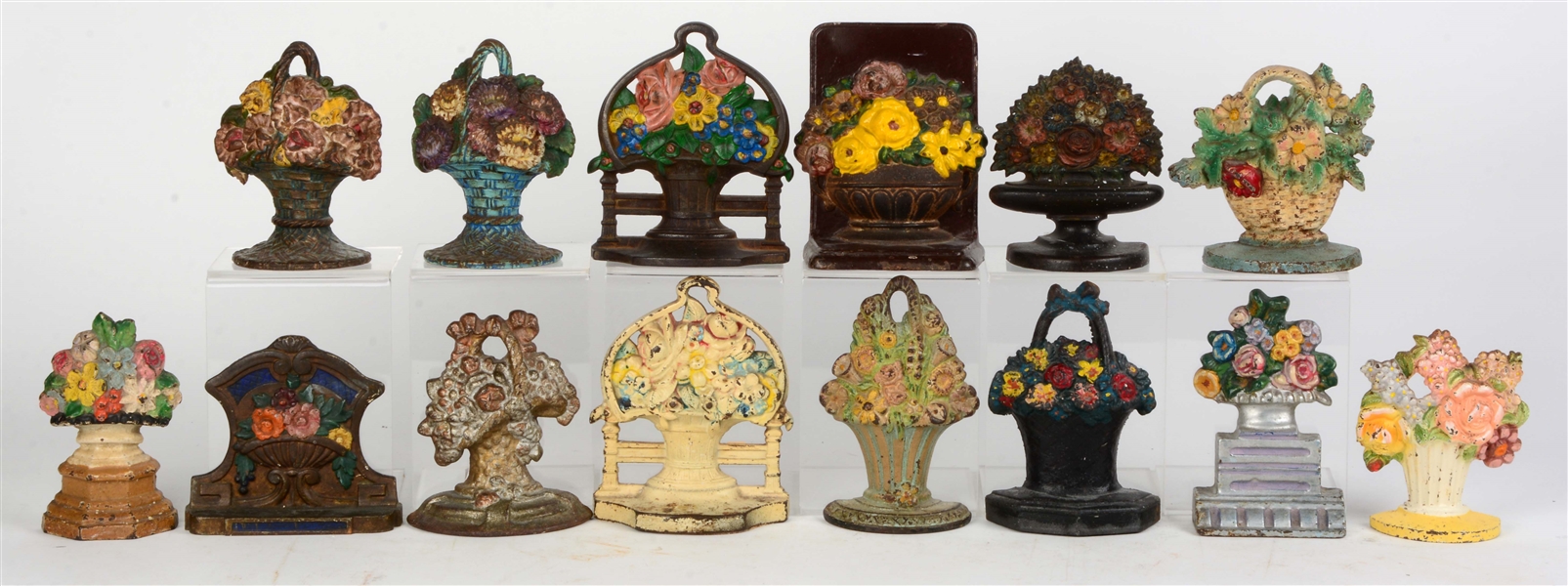LOT OF 14: CAST IRON FLOWER SINGLE BOOKENDS.