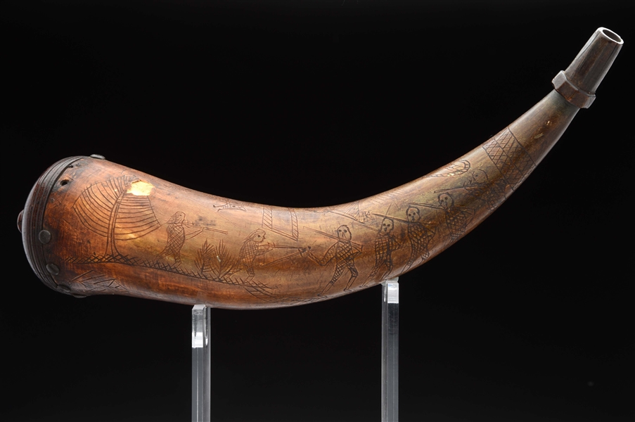 ENGRAVED POWDER HORN CARVED WITH SOLDIERS IN BATTLE.