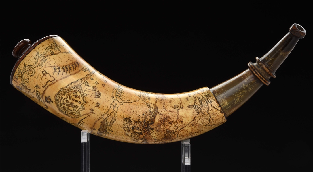 ENGRAVED QUEBEC MAP POWDER HORN, ATTRIBUTED TO THE MASTER CARVER.