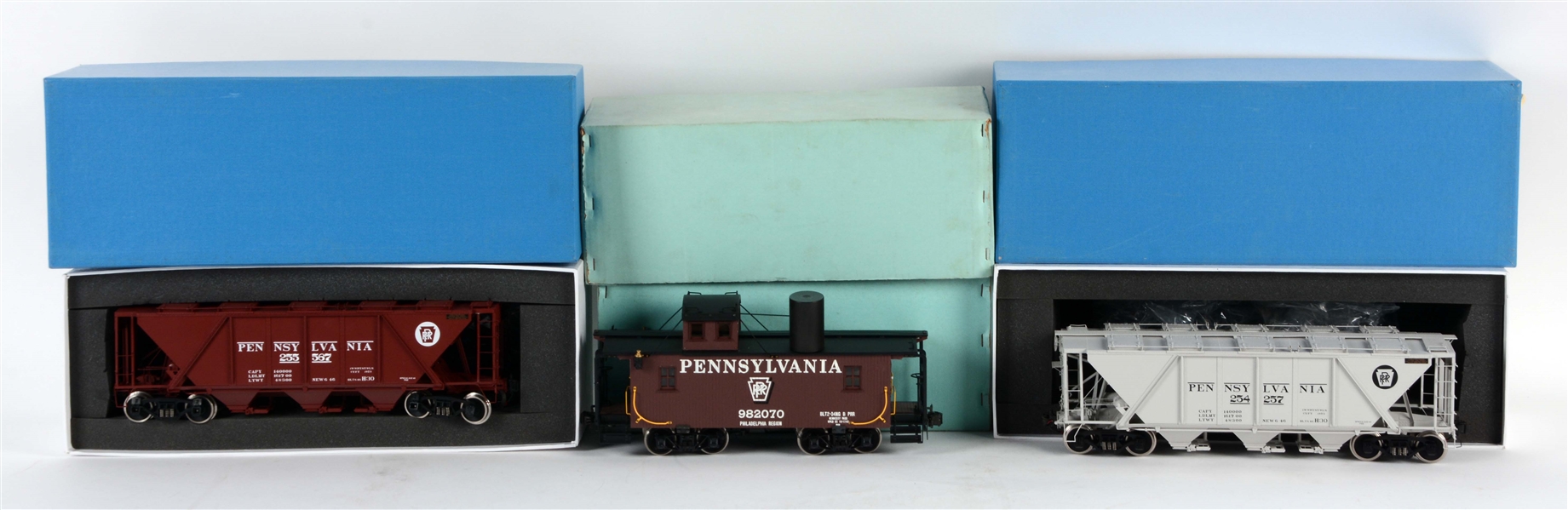 LOT OF 3: BRASS TRAIN CARS IN BOXES.