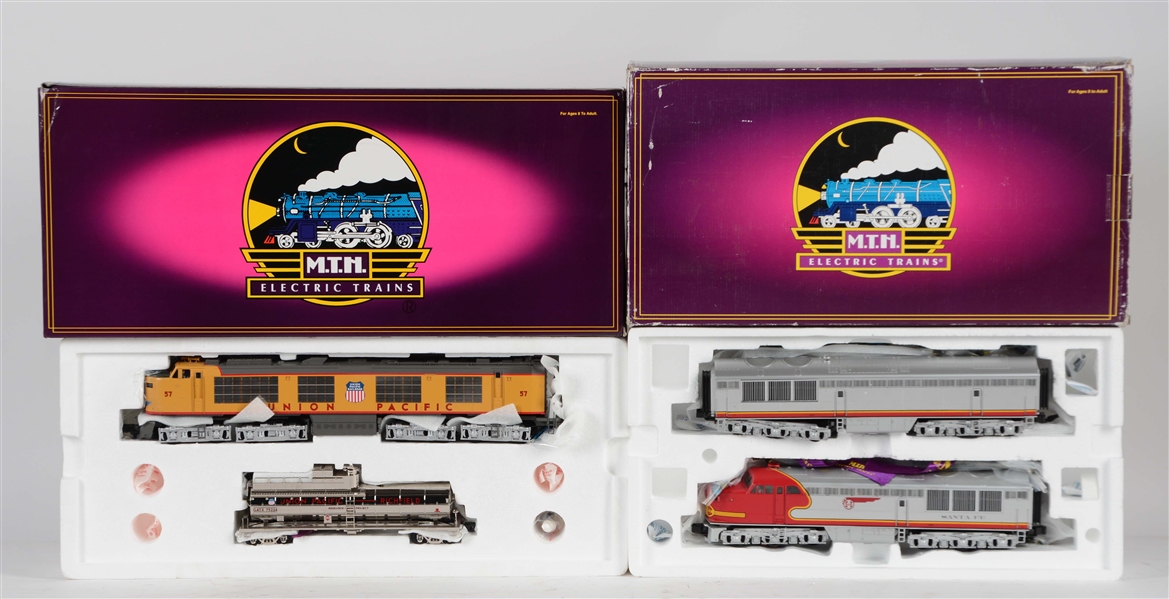 LOT OF 2: MTH LOCOMOTIVE SETS IN BOXES.