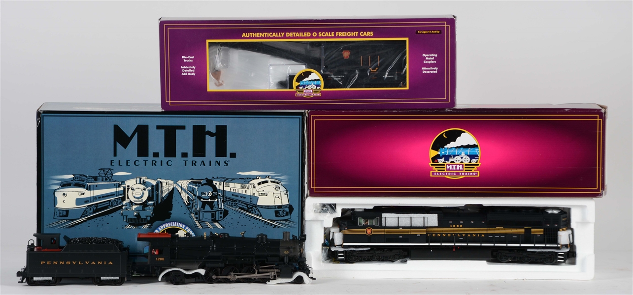 LOT OF 3: MTH TRAIN CARS AND ENGINES IN BOXES.