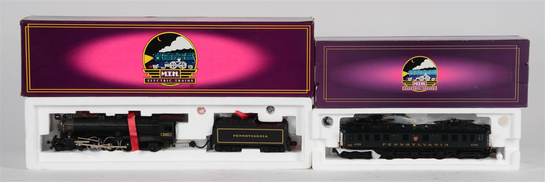 LOT OF 2: MTH ELECTRIC LOCOMOTIVE & STEAM ENGINE IN BOXES.