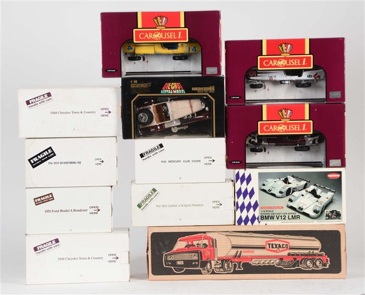 LOT OF 12: DANBURY MINT AND OTHER DIE-CAST MODELS IN BOXES.
