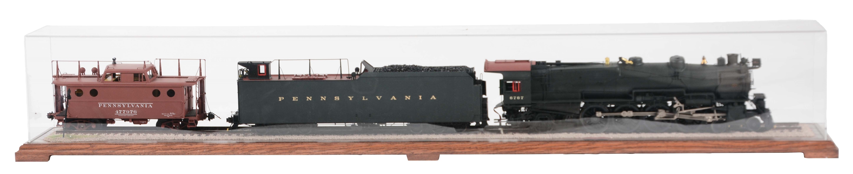 462 MOUNTAIN ENGINE & LONG HAUL TENDER & PRR CABOOSE IN DISPLAY CASE.