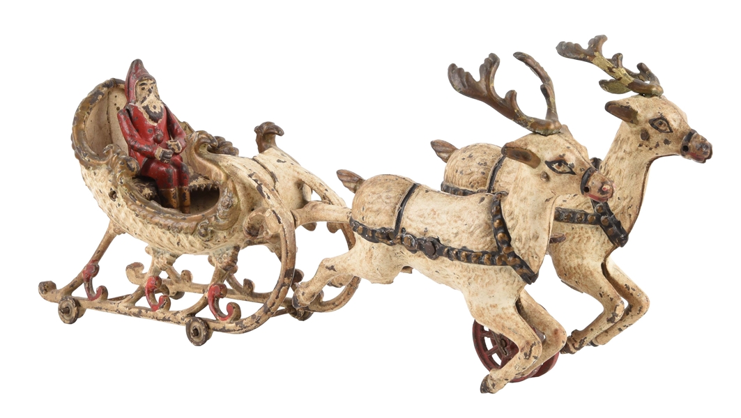 CAST IRON HUBLEY SANTA CLAUSE SLEIGH PULLED BY REINDEER. 