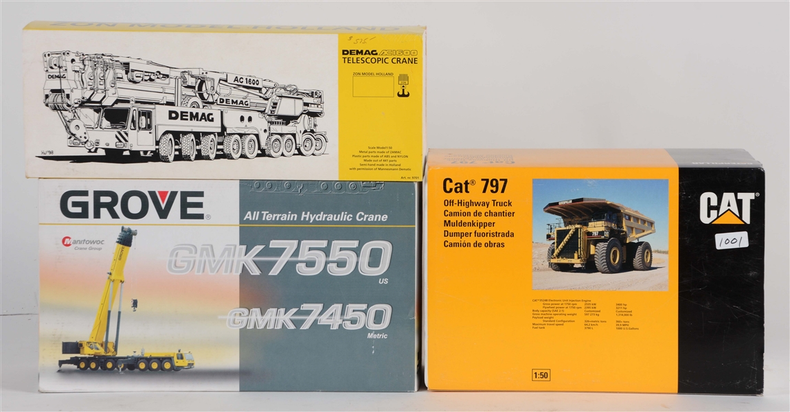 LOT OF 3: CONSTRUCTION VEHICLES IN BOXES.