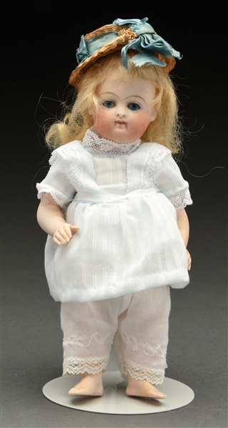 ALL BISQUE DOLL WITH BARE FEET.