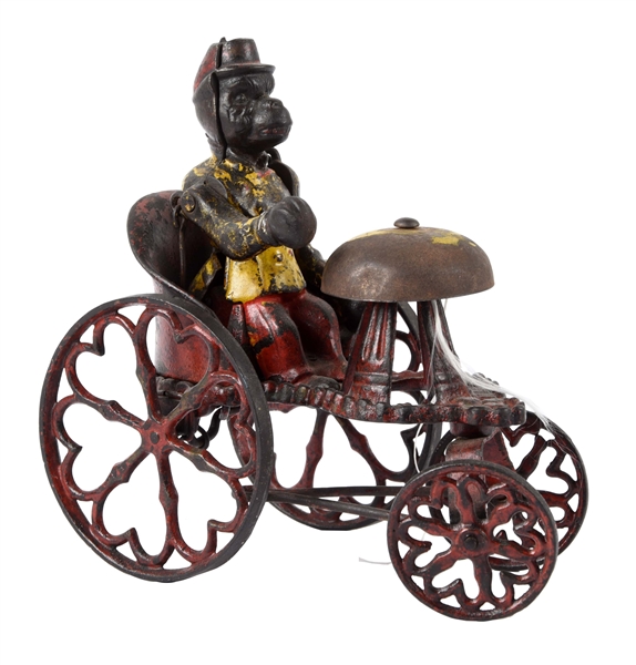CAST IRON KYSER & REX MONKEY IN CHARIOT BELL TOY.