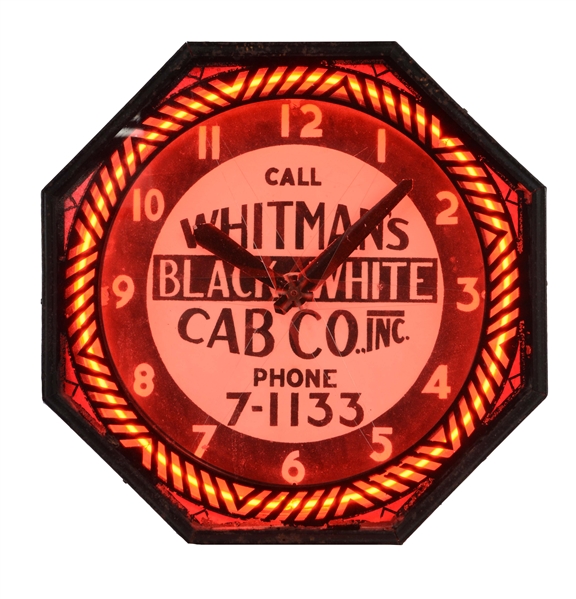 WHITMANS BLACK & WHITE CAB CO. NEON SPINNER CLOCK.
