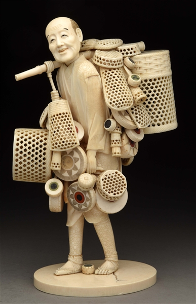 RARE HIGHLY CARVED JAPANESE MAN CARRYING BASKETS.