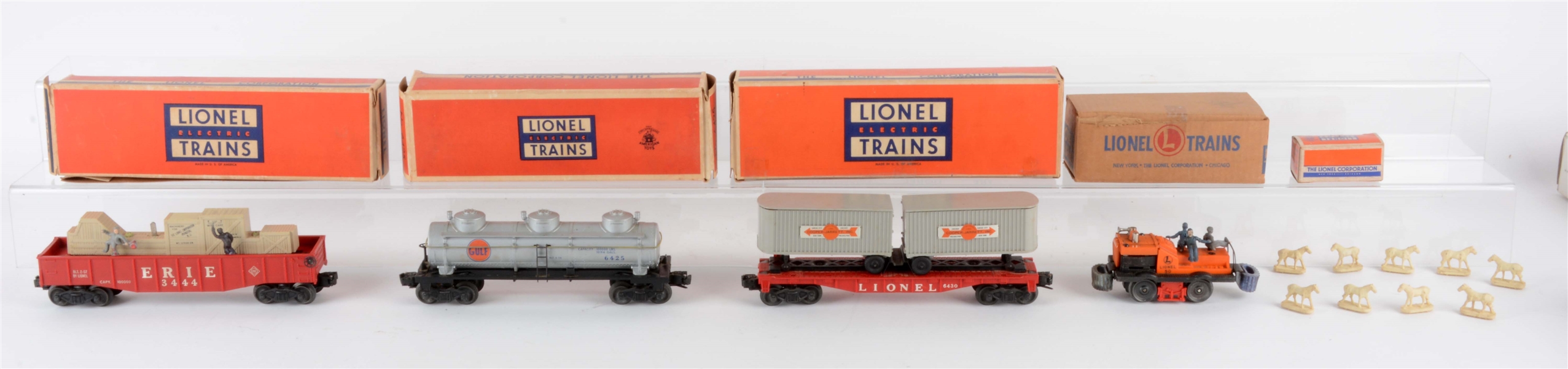 LOT OF LIONEL POST-WAR TRAINS IN BOXES. 