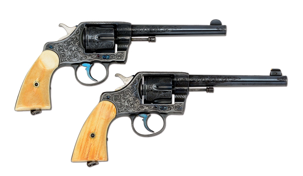 (C)EXTREMELY FINE AND RARE PAIR OF CONSECUTIVELY NUMBERED & FACTORY ENGRAVED COLT 1903 ARMY MODEL DOUBLE ACTION REVOLVERS (1903).