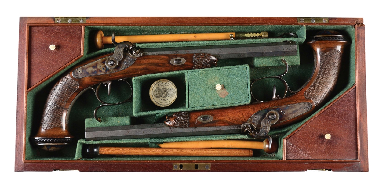 (A) CASED PAIR OF FRENCH DUELING OR TARGET PISTOLS.