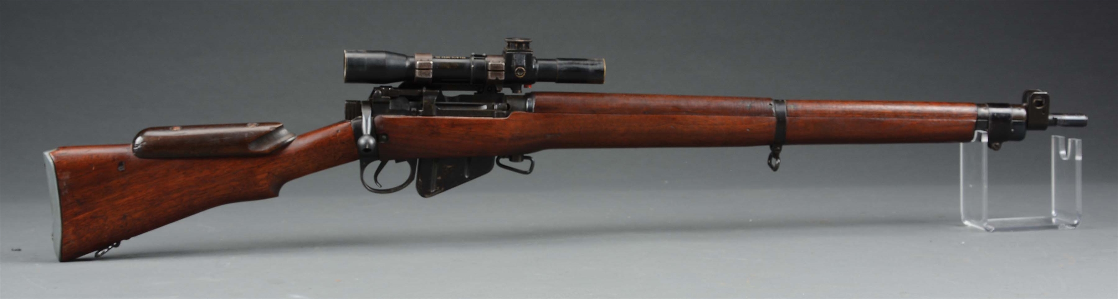 (C) CASED ENFIELD BOLT ACTION SNIPER RIFLE.