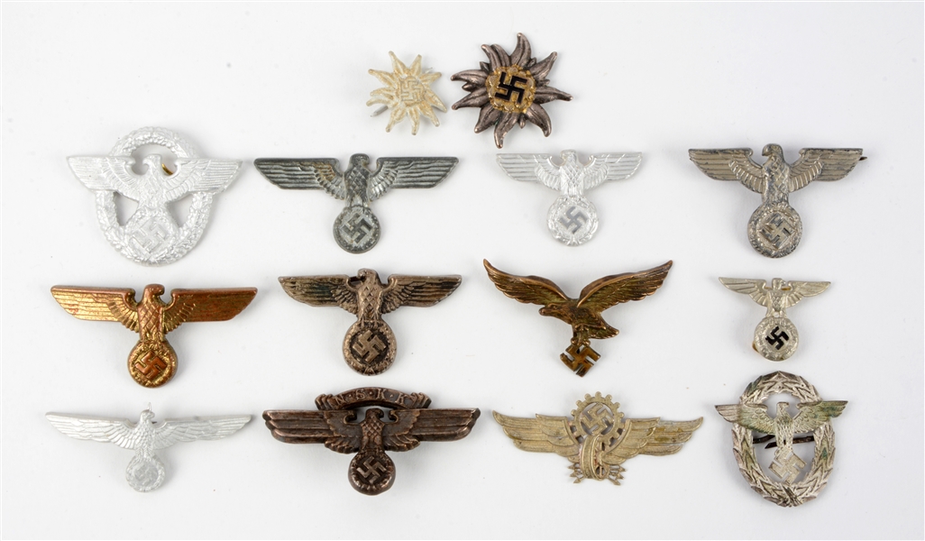 LOT OF 14: ASSORTED GERMAN WWII CAP BADGES.