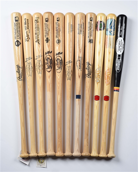 LOT OF 11: AUTOGRAPHED OR UNSIGNED BASEBALL BATS.