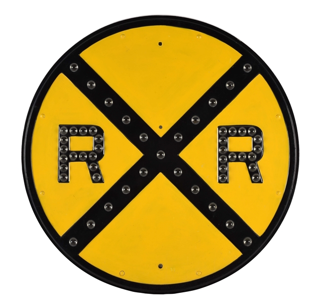 EMBOSSED STEEL RAIL ROAD CROSSING SIGN WITH GLASS CAT EYE REFLECTORS.