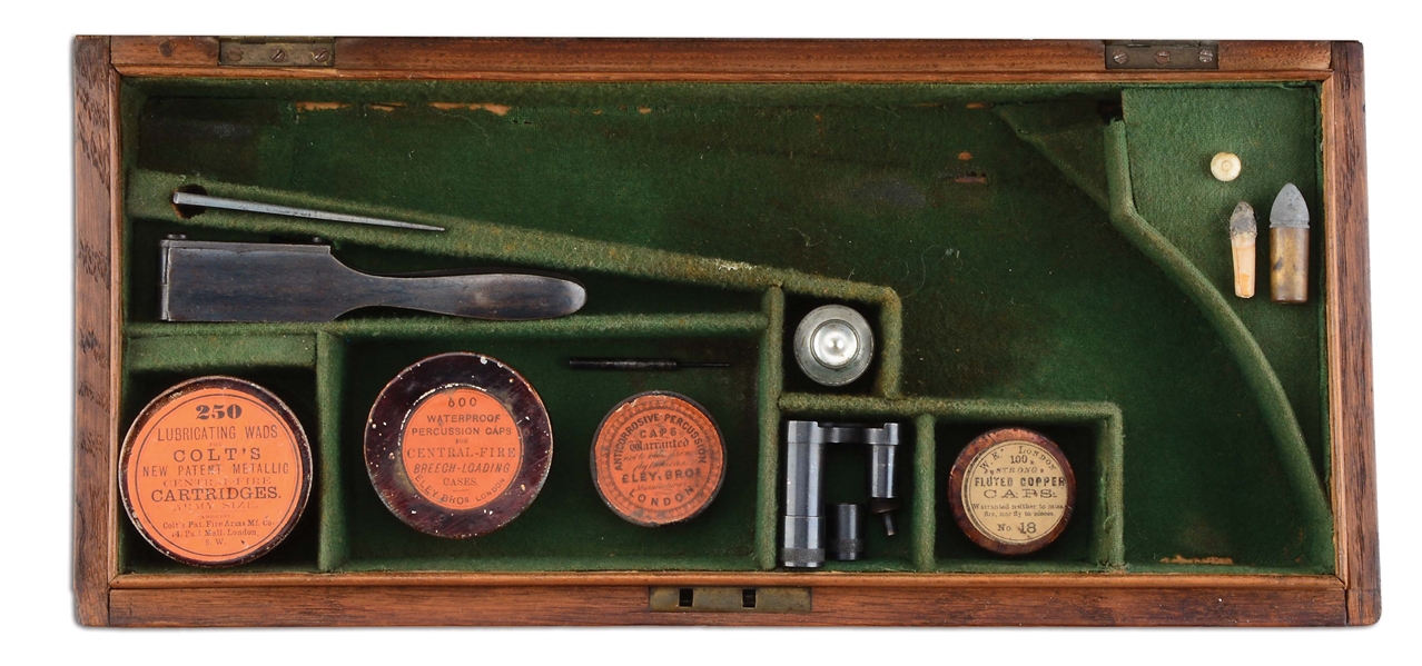 CASE FOR COLT 1860 THEUR CONVERSION WITH MOLD, LUBRICATING WAD, AND ELEY CAP TIN.