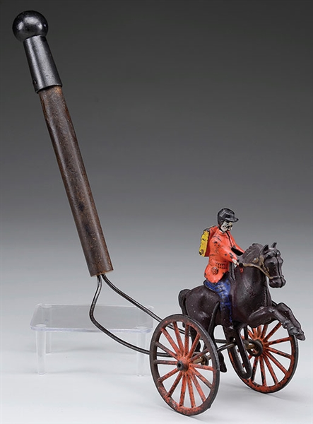 CAST IRON TOY OF SOLDIER ON HORSEBACK                                                                                                                                                                   