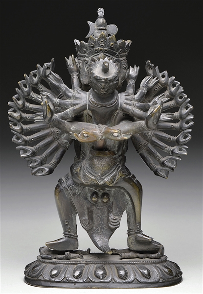 BRONZE FIGURE OF A TANTRIC DIVINITY                                                                                                                                                                     