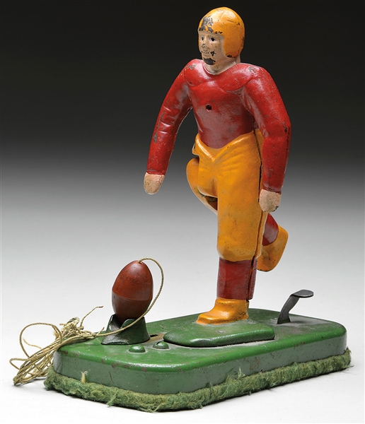 CAST IRON MECHANICAL FOOTBALL PLAYER TOY                                                                                                                                                                