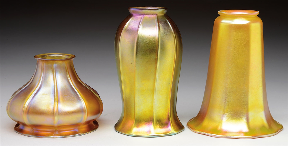 THREE GOLD IRIDESCENT ART GLASS SHADES                                                                                                                                                                  