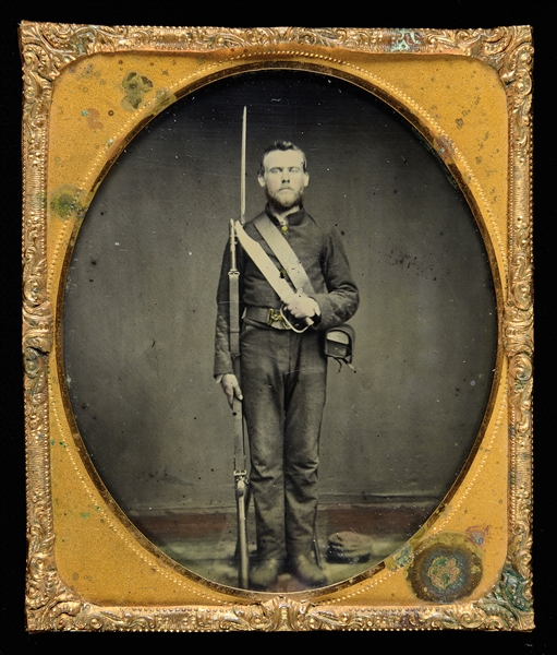 FINE, EARLY WAR CONFEDERATE AMBROTYPE OF SOLDIER WITH MASSIVE D-GUARD BOWIE.                                                                                                                            