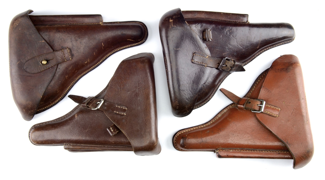 RARE SET OF FOUR DUTCH NAVY LUGER PISTOL HOLSTERS.                                                                                                                                                      