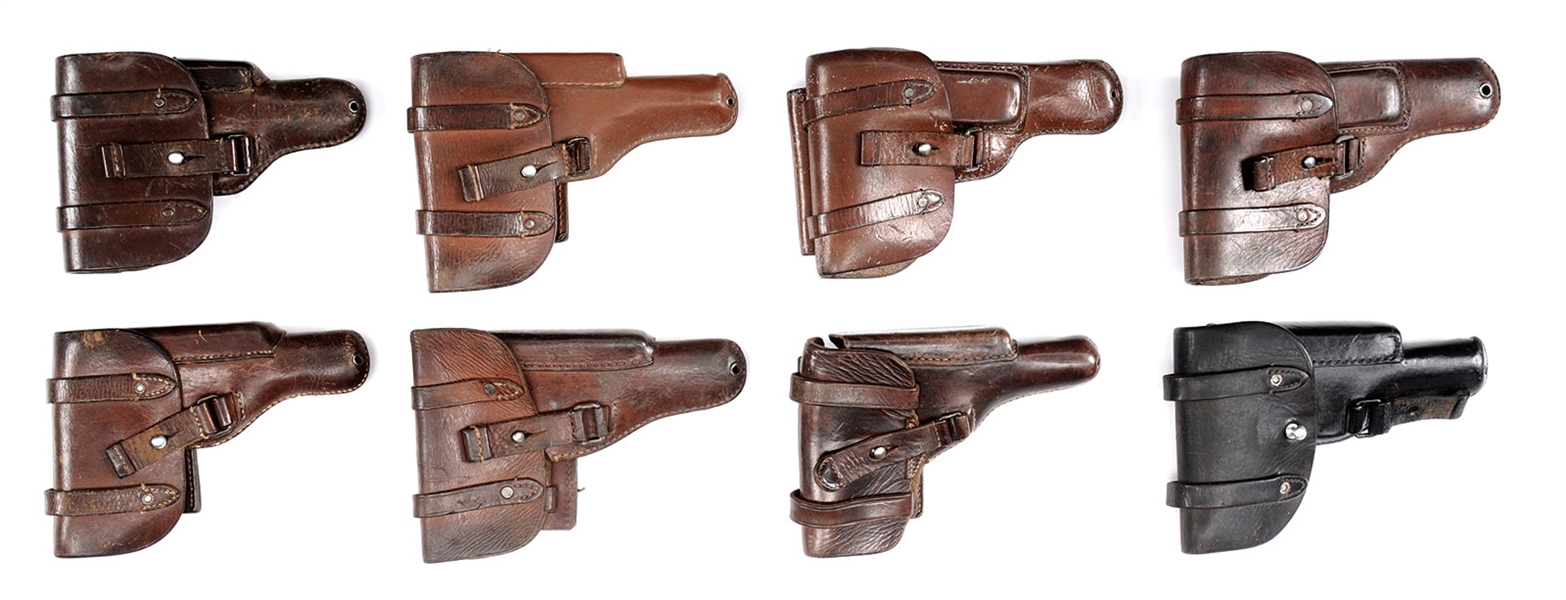 RARE GROUP OF EIGHT LUFTWAFFE THUERMANN PATENT DROPPING HOLSTERS.                                                                                                                                       