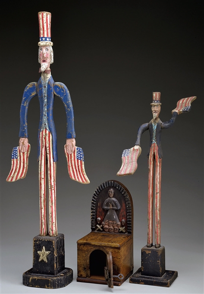TWO UNCLE SAM WHIRLYGIGS BY KENT GUTZMEN AND A CARVED AND PAINTED ALMS BOX                                                                                                                              