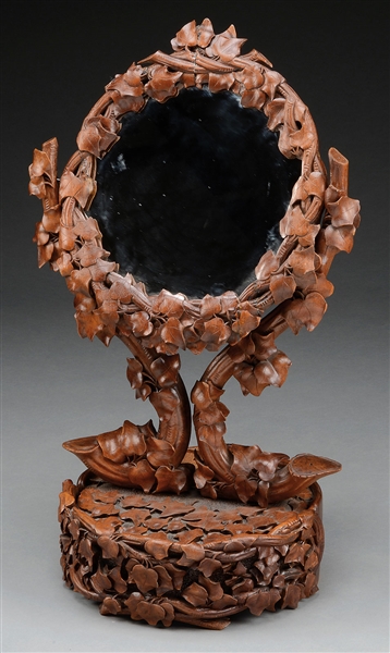 EXCEPTIONAL BLACK FOREST SHAVING MIRROR ON STAND.                                                                                                                                                       