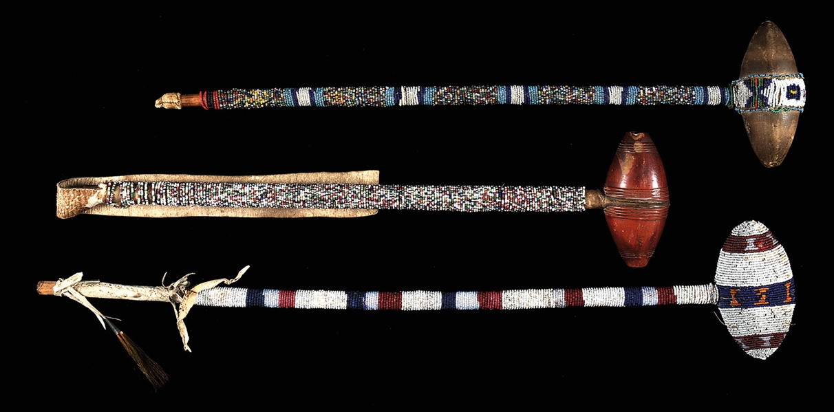 TWO PLAINS EQUESTIAN BEADED CLUBS AND AN UNUSUAL CATLINITE PIPE                                                                                                                                         