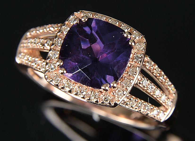 14KT ROSE GOLD DIAMOND AND AMETHYST LADYS RING.                                                                                                                                                       