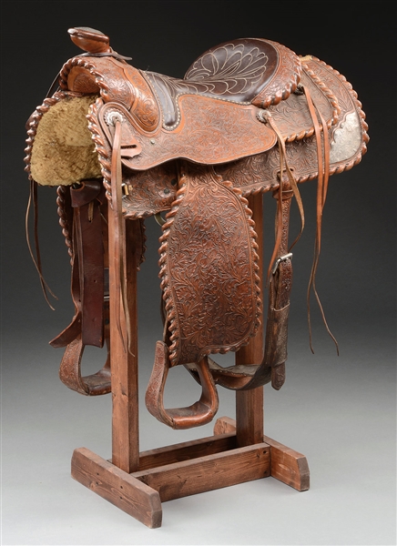 PARADE SADDLE WITH SILVER MOUNTS AND FANCY CARVING.                                                                                                                                                     