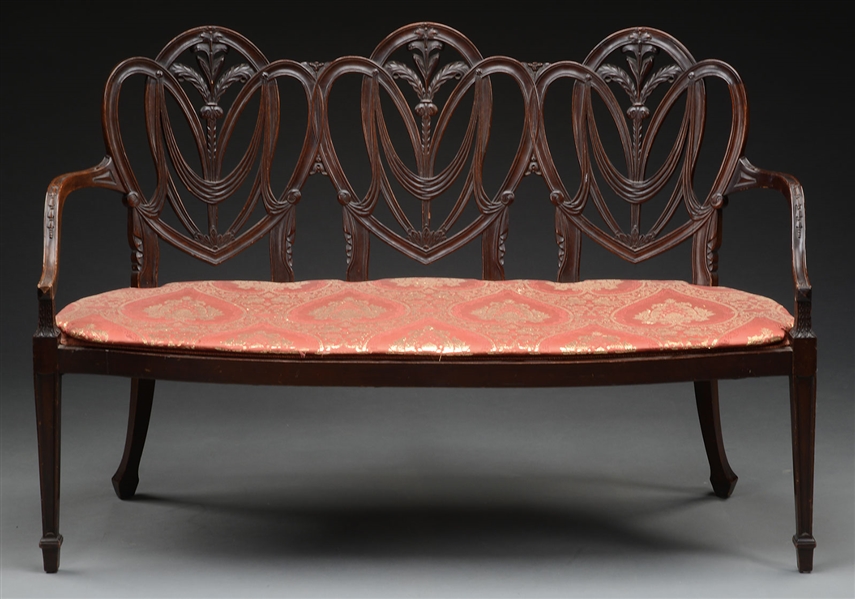 HANDSOME CENTENNIAL CARVED MAHOGANY 3-SHIELD BACK SETTEE.                                                                                                                                               