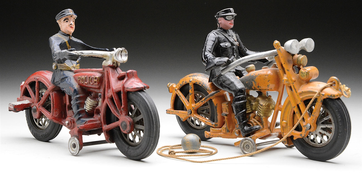 TWO CAST IRON POLICE MOTORCYCLE                                                                                                                                                                         
