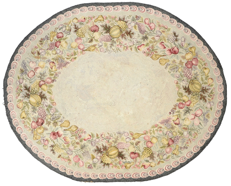 OVAL WOOL RUG WITH FRUIT MOTIF.                                                                                                                                                                         