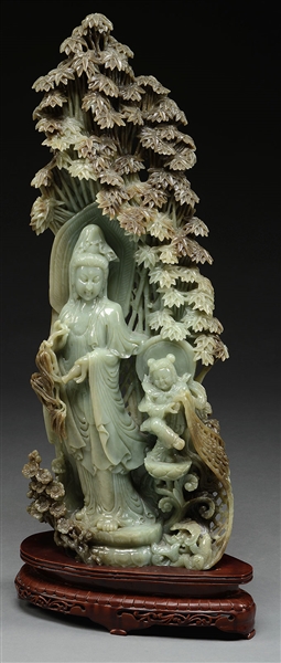 LARGE GREEN JADE FIGURE OF GUANYIN AND ATTENDANT.                                                                                                                                                       