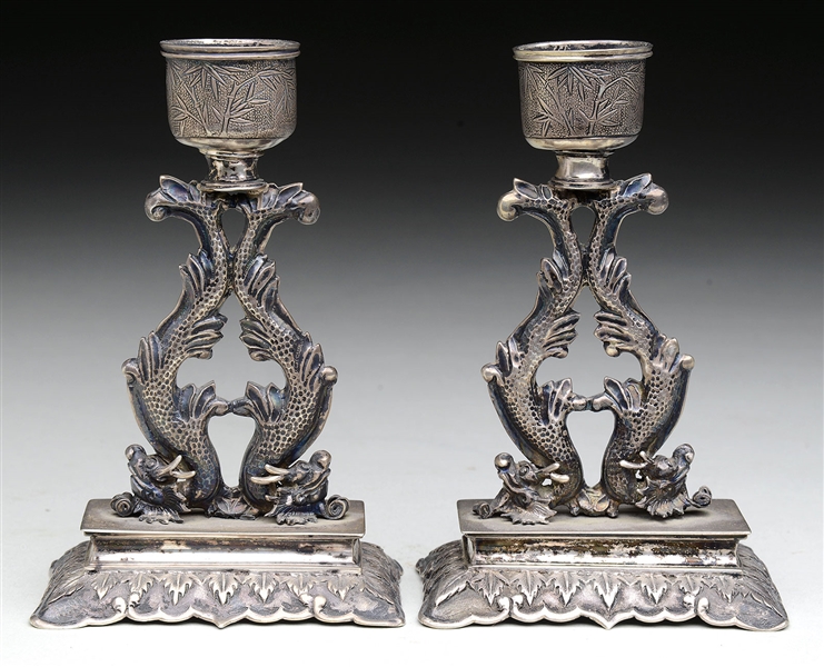 PAIR OF EXPORT SILVER CANDLE HOLDERS.                                                                                                                                                                   