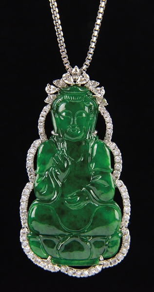CARVED ICY TRANSPARENT JADEITE GUANYIN PENDANT WITH WHITE GOLD NECKLACE.                                                                                                                                
