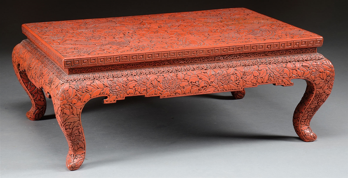 CINNABAR LACQUER CARVED LOW TABLE.                                                                                                                                                                      