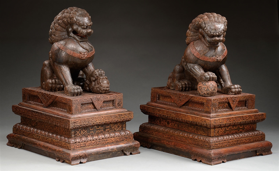 PAIR OF MONUMENTAL LACQUERED WOOD FOO LIONS.                                                                                                                                                            