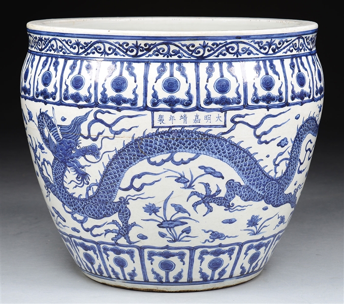 LARGE MING STYLE BLUE AND WHITE DRAGON PLANTER.                                                                                                                                                         