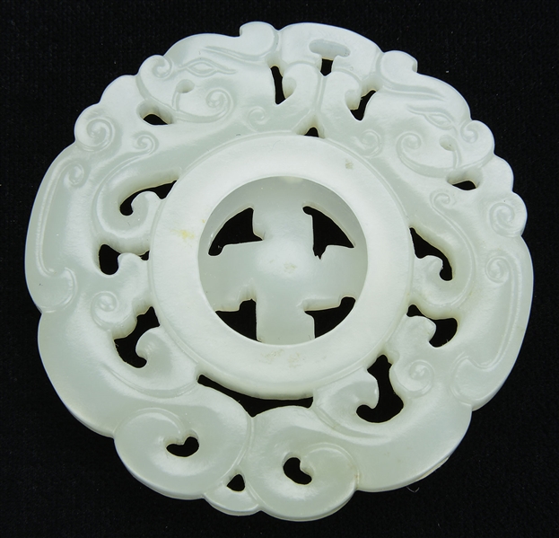 WHITE JADE RETICULATED DISC.                                                                                                                                                                            