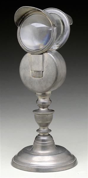 DOUBLE BULLS EYE PEWTER FLUID LAMP ATTRIBUTED TO FREEMAN PORTER.                                                                                                                                        