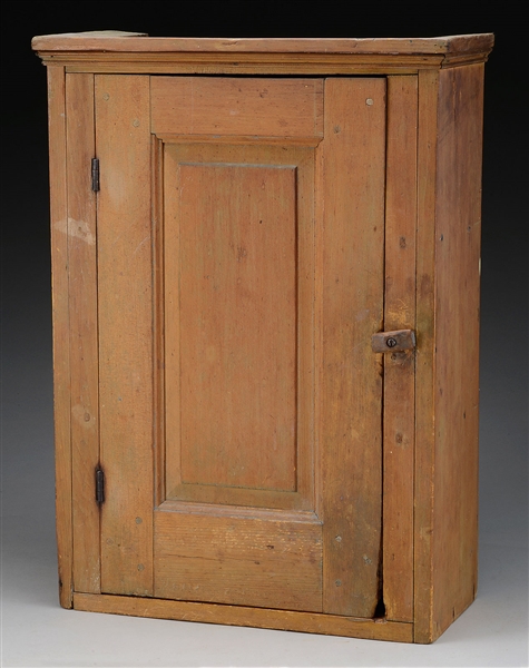 SMALL PINE WALL CABINET WITH RAISED PANEL DOOR.                                                                                                                                                         